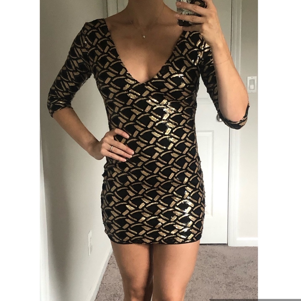 Black and gold sequin mini dress